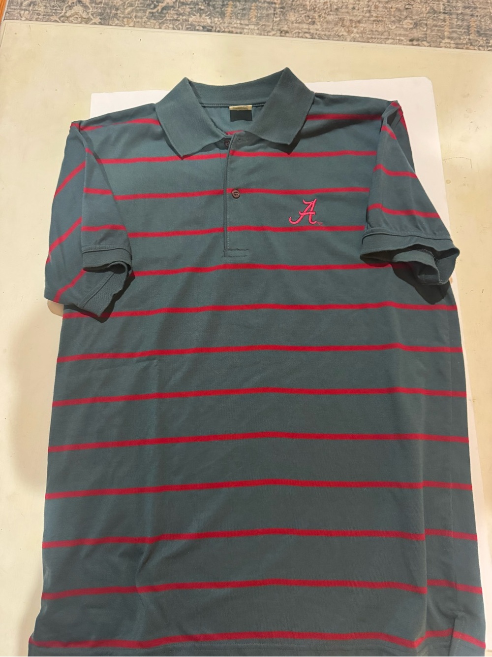 Striped Green Polo Shirt with Red Accents